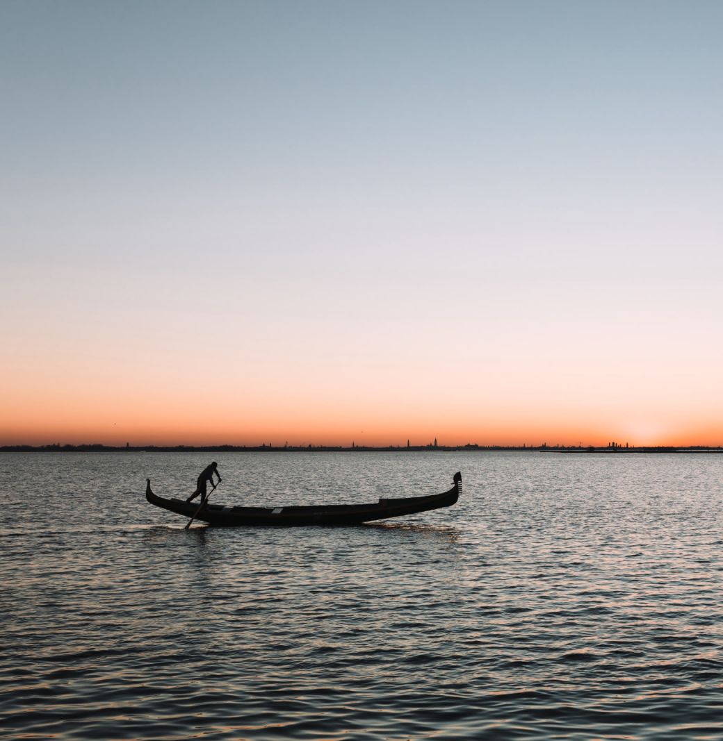 gondola at sunset in the lagoon